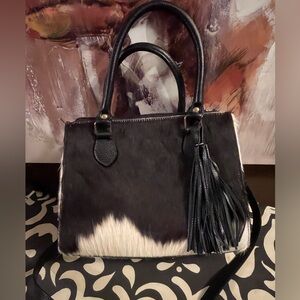 Half calf hair handbag.